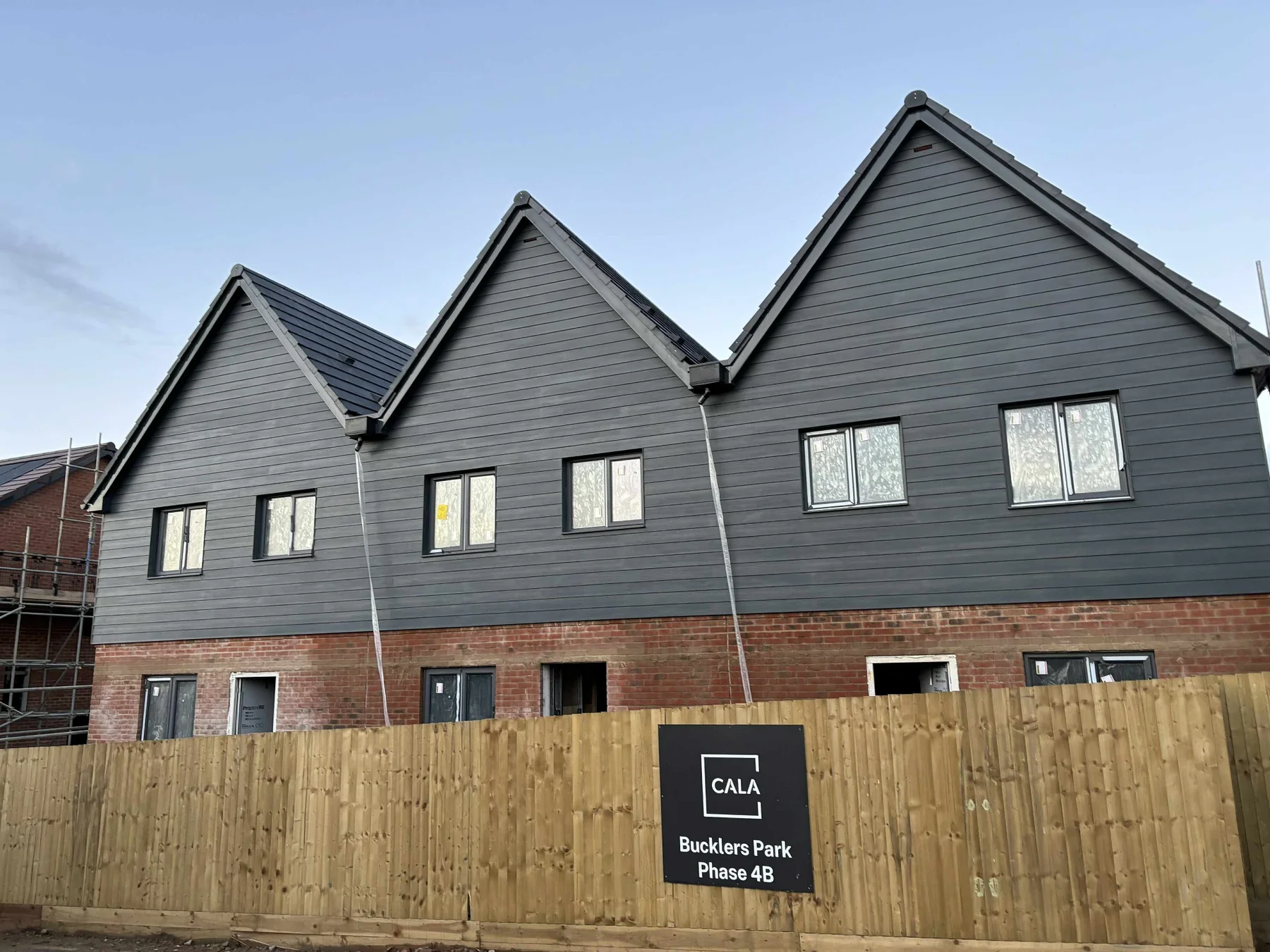 Multi-unit residential development with completed black facade cladding